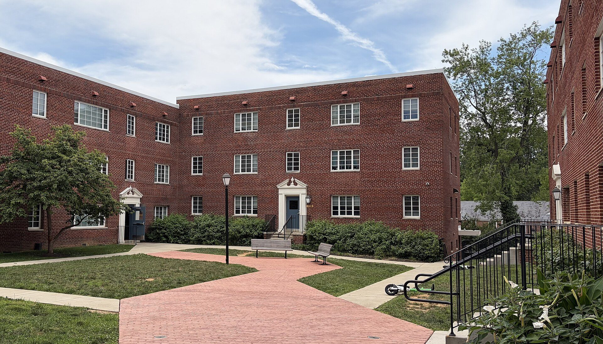 Brick garden apartment buildings around a courtyard